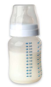 White breast milk in a baby bottle.